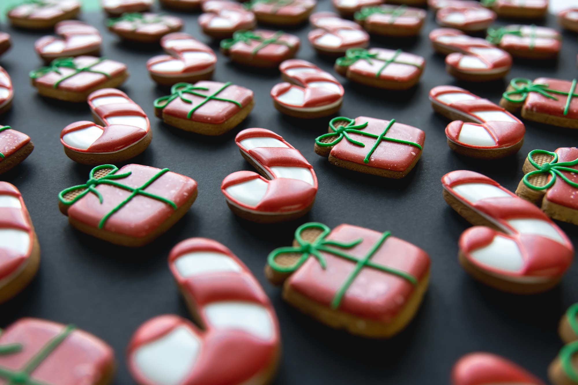 Christmas gingerbread covered with multi-colored icing, close-up.