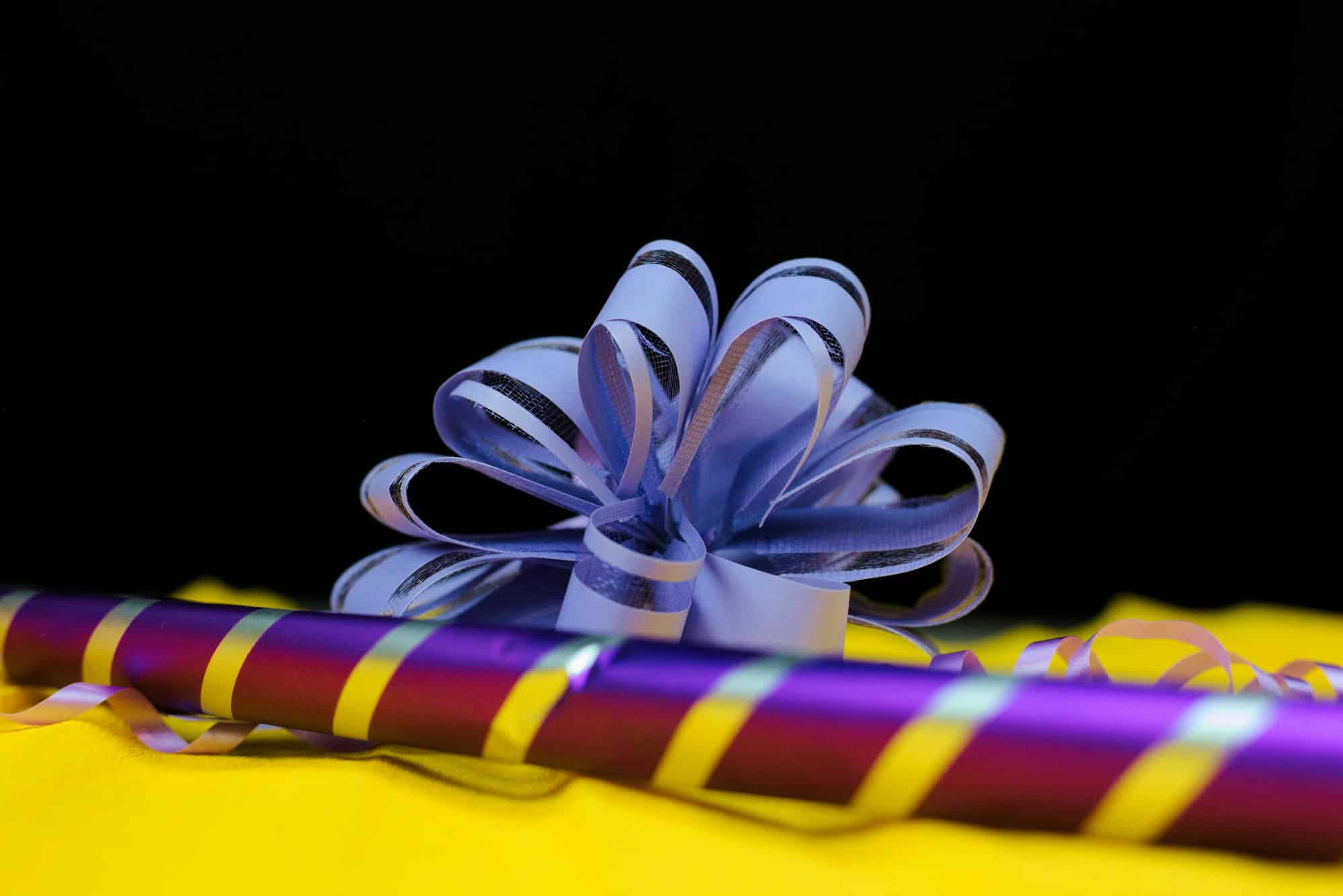 Closeup shot of wrapping paper and bows - holidays concept