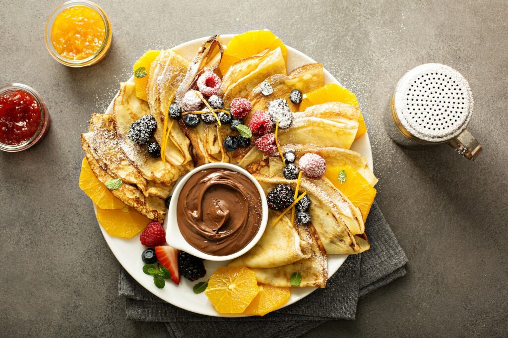 Thin crepes with fresh fruit and berries